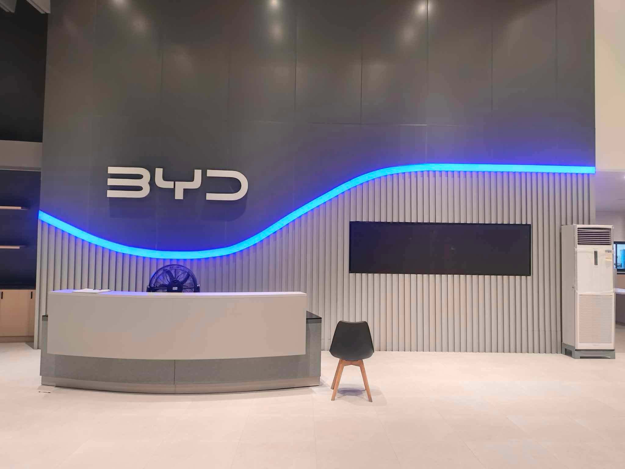 BYD Showroom Exterior Facade Signage and Interior Reception Wall Feature